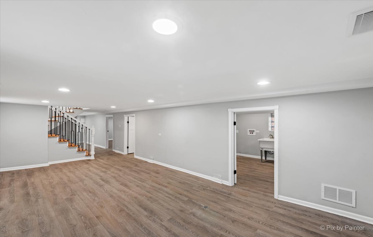 1902 South 9th Avenue Maywood, IL 60153 - Photo 36 of 51 a view of empty room with wooden floor