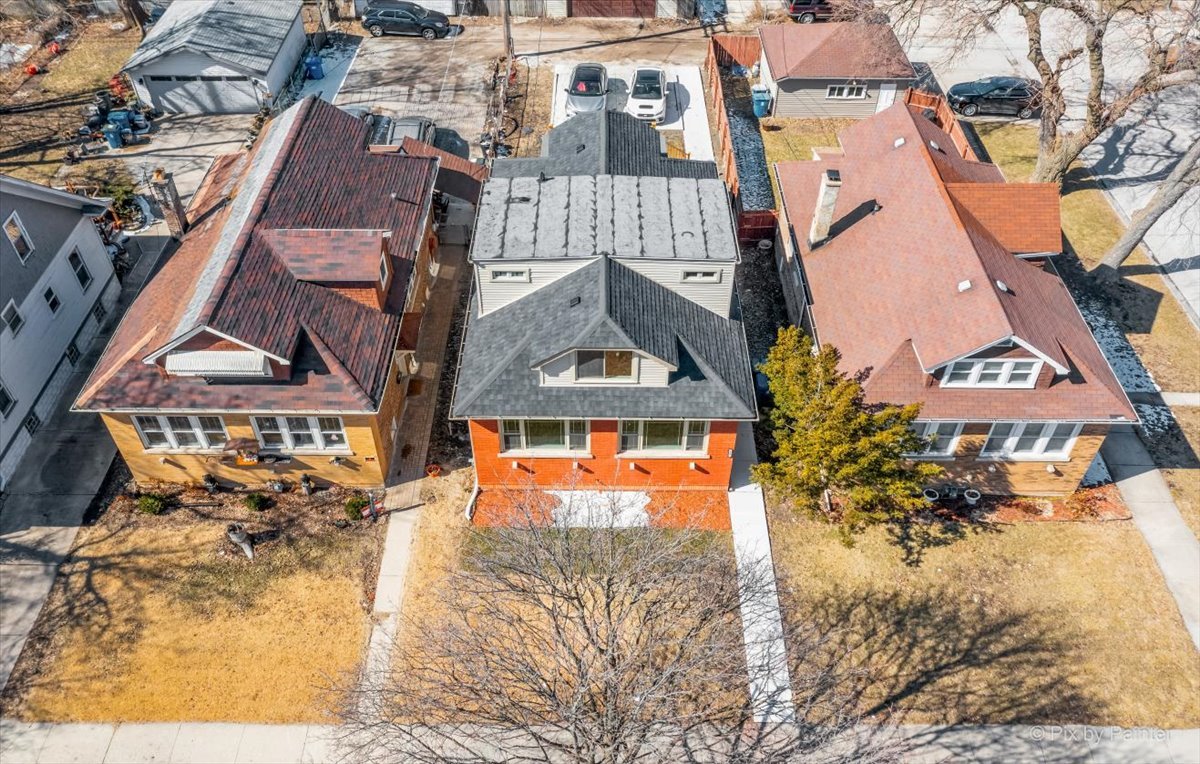 1902 South 9th Avenue Maywood, IL 60153 - Photo 43 of 51 an aerial view of a house with a swimming pool