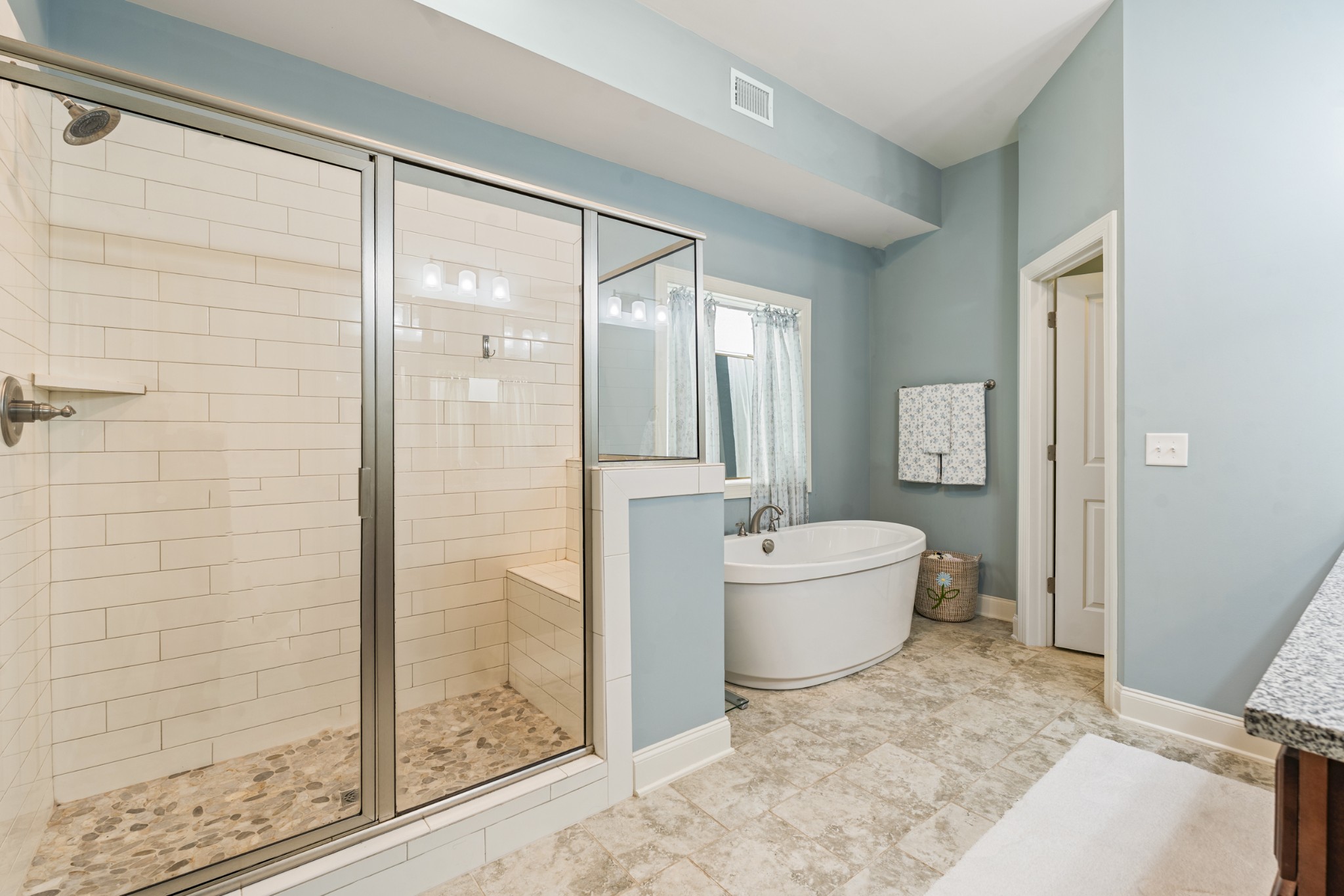 3433 Cortona Way Murfreesboro, TN 37129 - Photo 17 of 32 a bathroom with a tub shower and sink