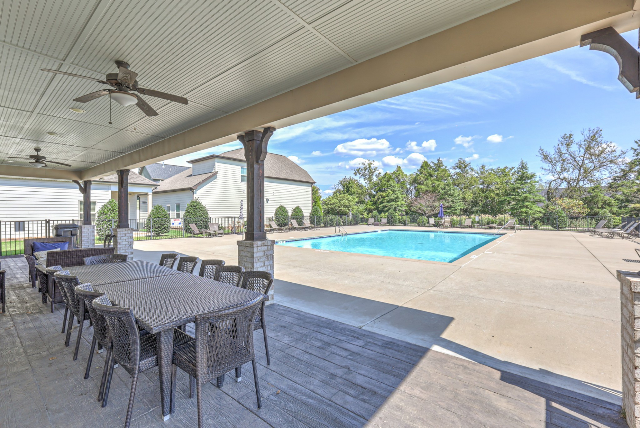 3433 Cortona Way Murfreesboro, TN 37129 - Photo 30 of 32 a view of a patio with a table chairs and a backyard