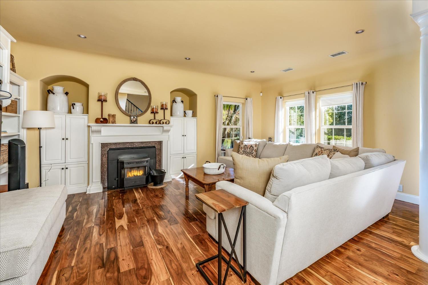 28853 Limestone Way Coarsegold, CA 93614 - Photo 16 of 54 a living room with furniture and a fireplace