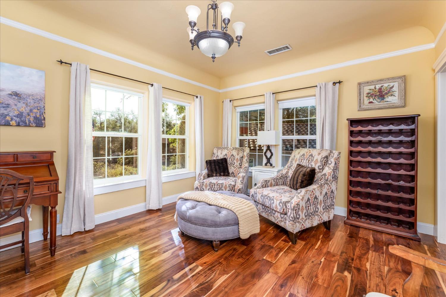 28853 Limestone Way Coarsegold, CA 93614 - Photo 19 of 54 a bedroom with furniture and a large window