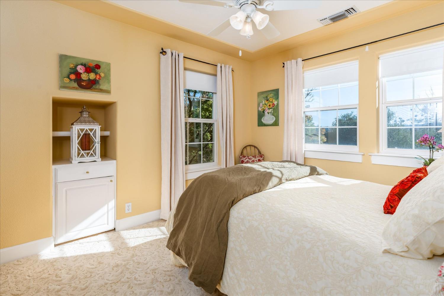 28853 Limestone Way Coarsegold, CA 93614 - Photo 31 of 54 a bedroom with a bed and a large window