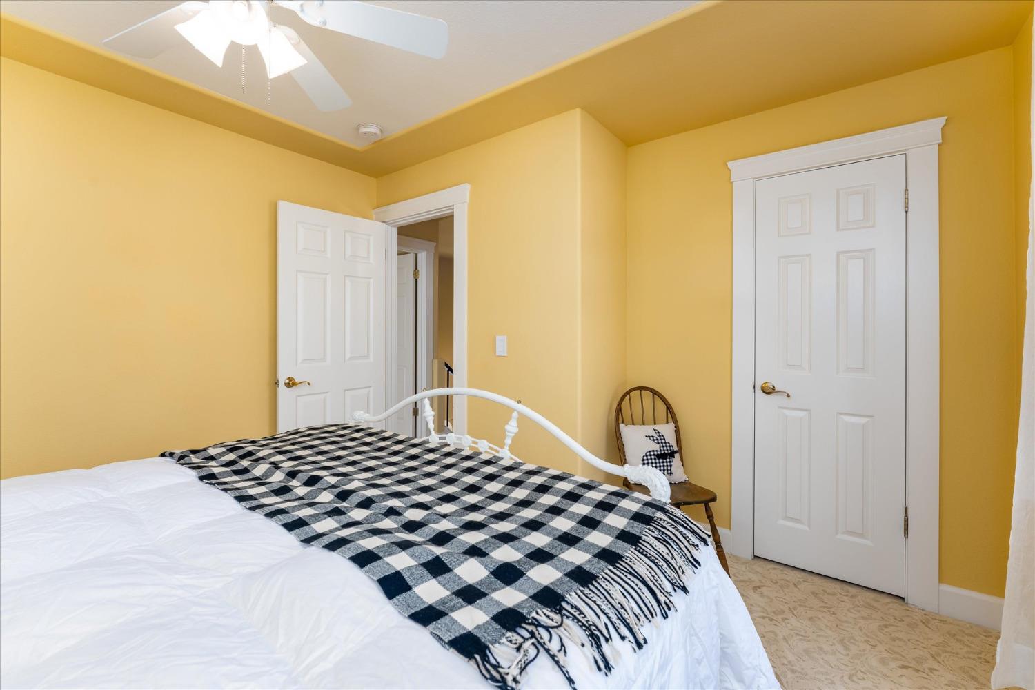 28853 Limestone Way Coarsegold, CA 93614 - Photo 34 of 54 a bedroom with a bed and a window