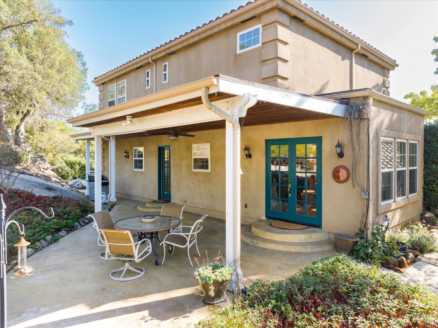 28853 Limestone Way Coarsegold, CA 93614 - Photo 42 of 54 a backyard of a house with outdoor seating