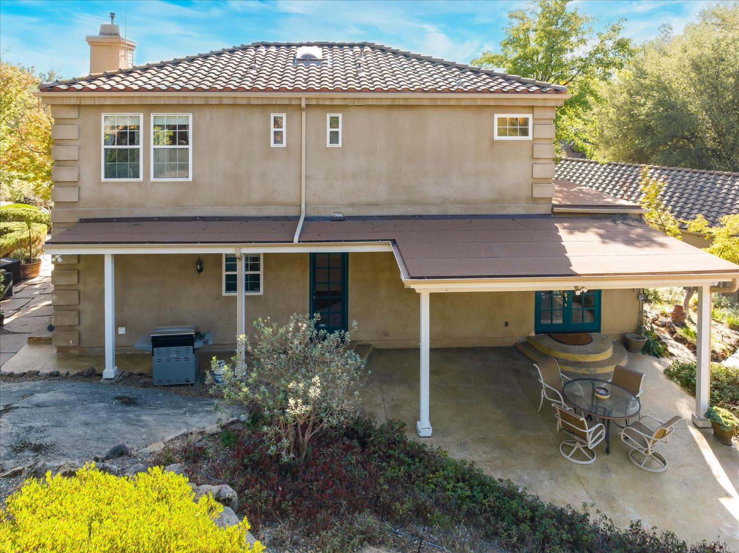 28853 Limestone Way Coarsegold, CA 93614 - Photo 43 of 54 front view of a house with a yard