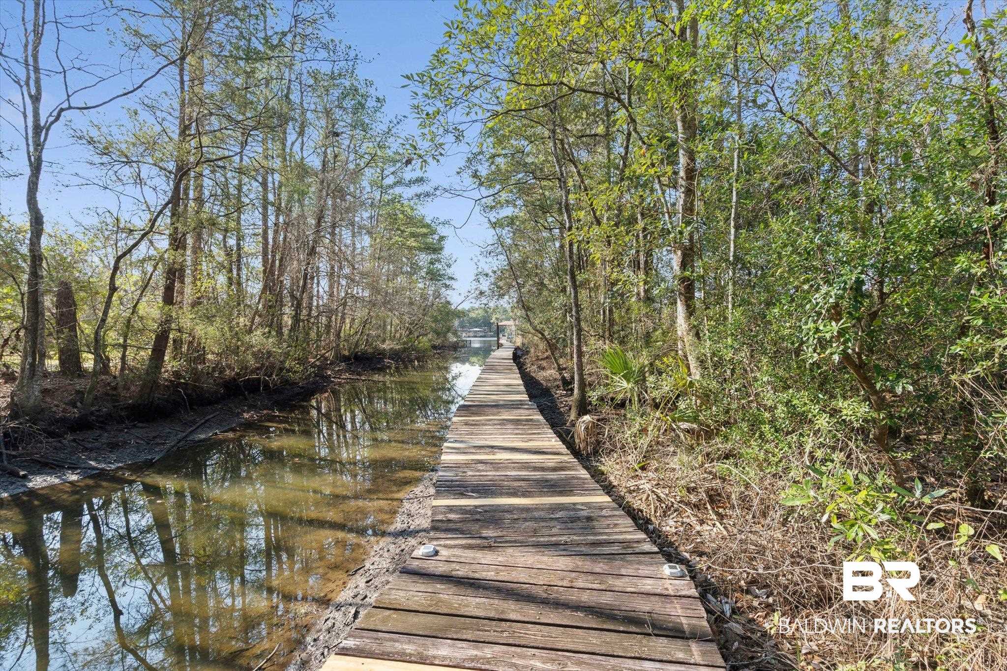 3847 Riviere Du Chien Road Mobile, AL 36693 - Photo 28 of 51 Dock featuring a water view