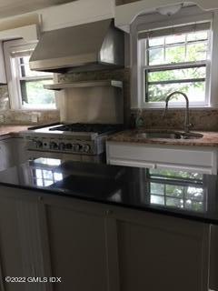 12 Old Post Road Cos Cob, CT 06830 - Photo 14 of 34 a kitchen with stainless steel appliances a stove and a sink