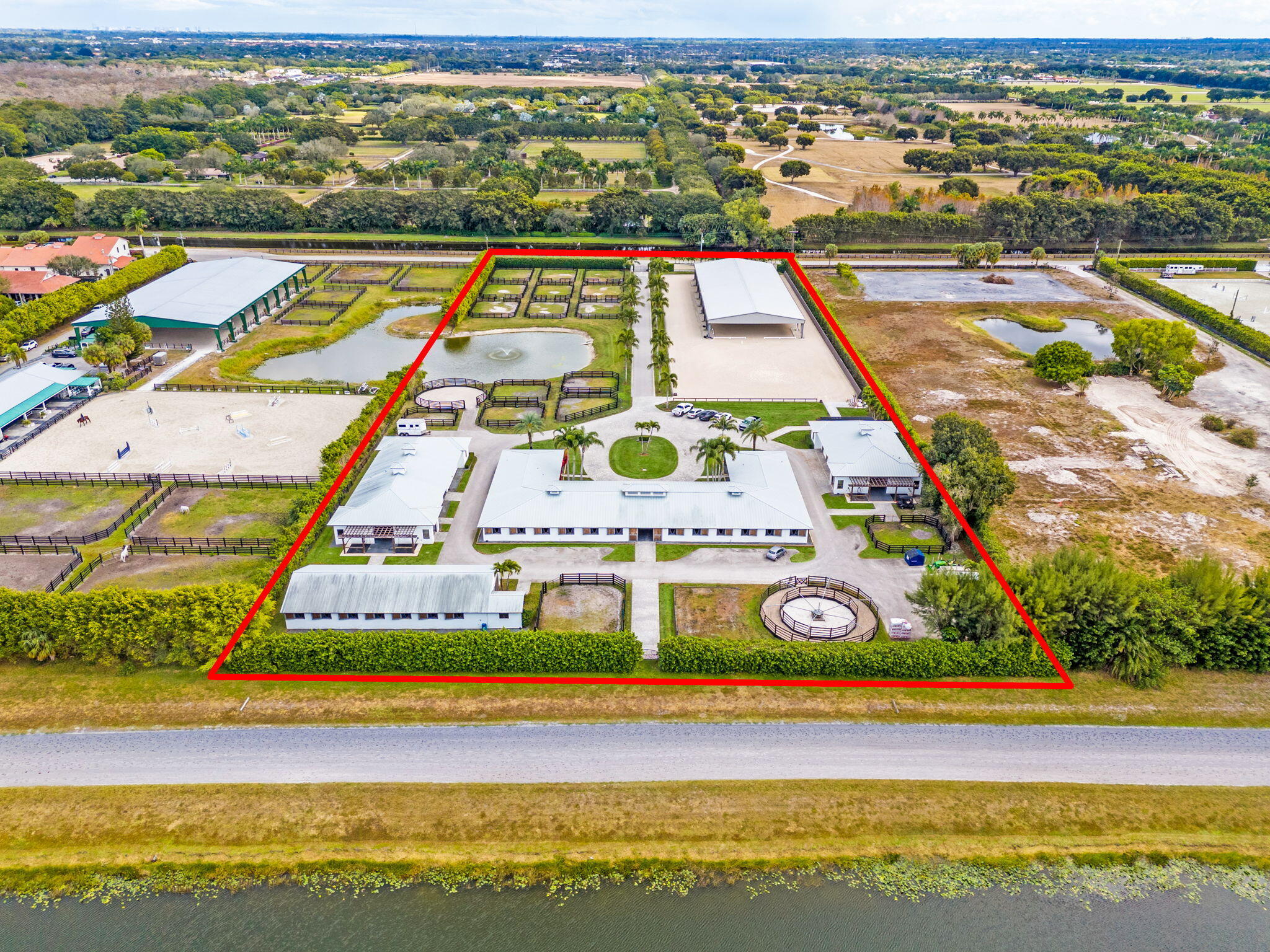 13155 Southfields Road Wellington, FL 33414 - Photo 66 of 70 98-web-or-mls-DJI_20260204131159_0435_D-