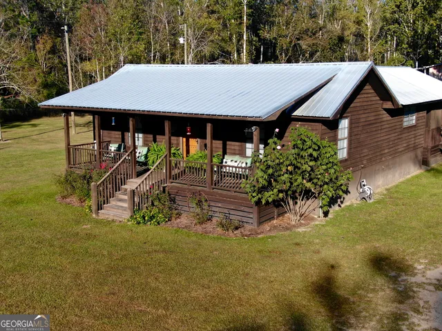 a bathroom with a double vanity sink toilet and shower