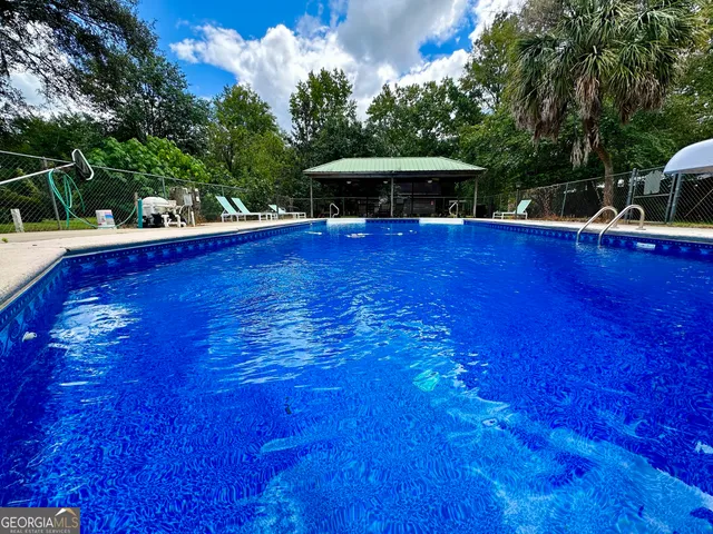 a view of a lake in middle of the town
