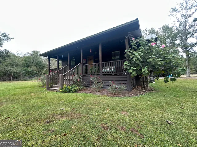 a view of a lake with lots of trees