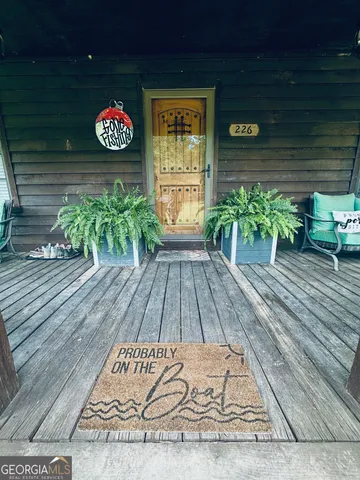 a view of outdoor space with trees all around