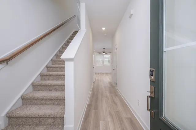 a view of entryway with wooden floor