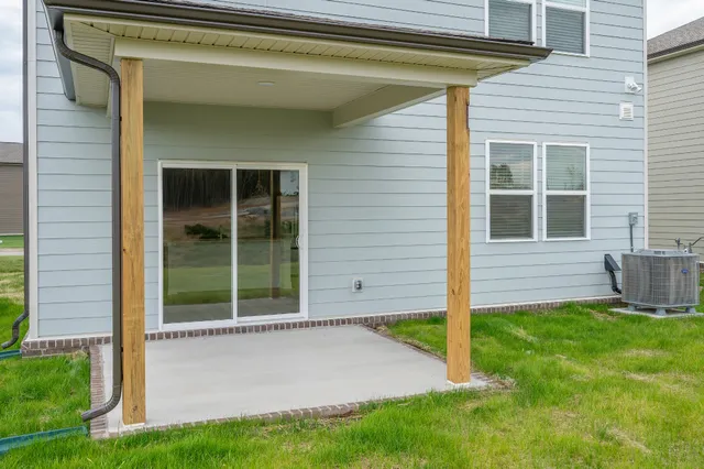 a view of a porch and a yard