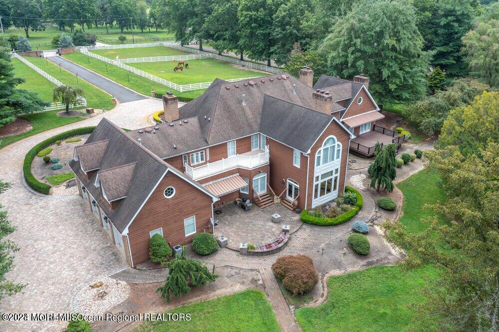 65 Cross Road Colts Neck, NJ 07722 - Photo 4 of 21 an aerial view of a house