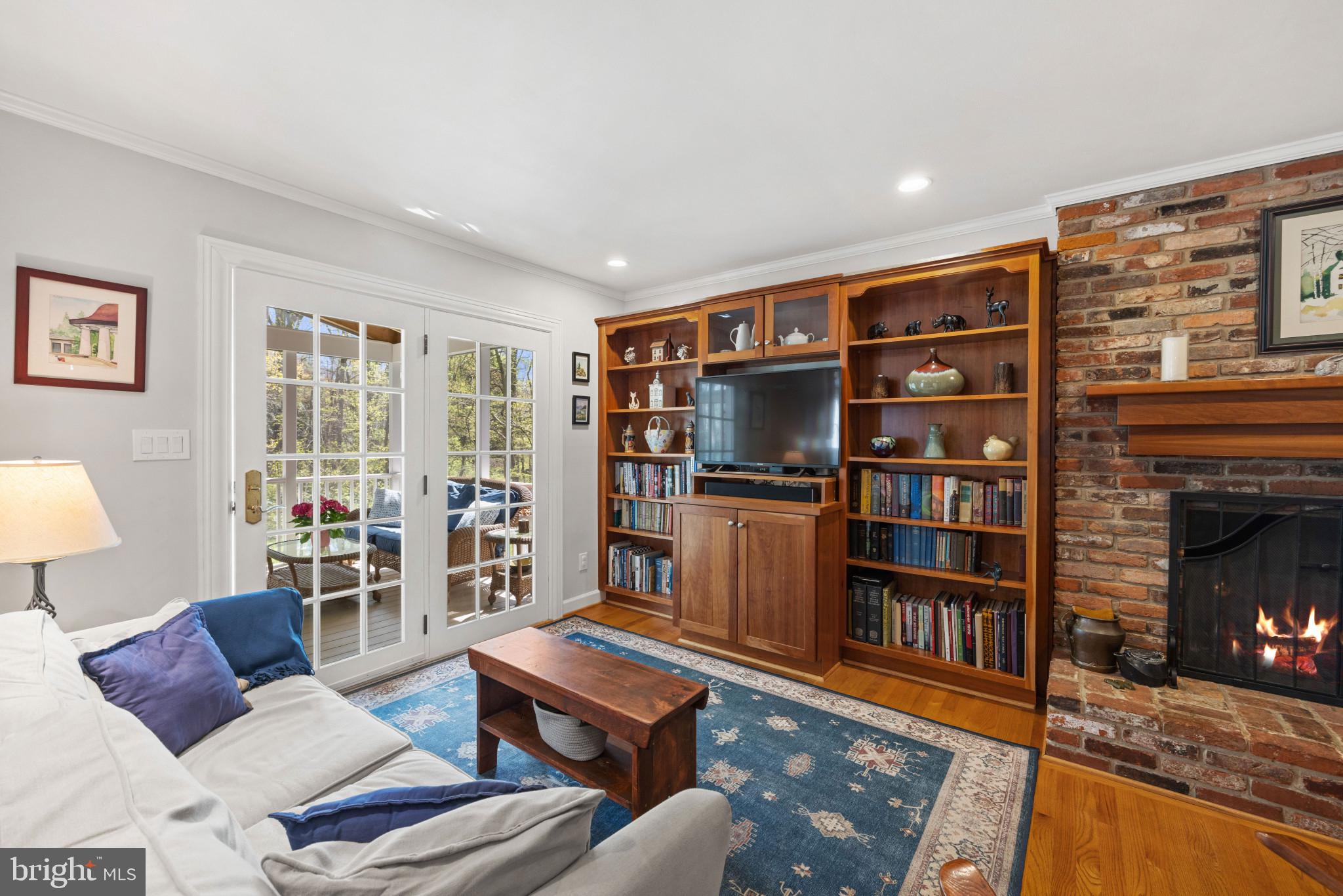 437 Edgemere Drive Annapolis, MD 21403 - Photo 11 of 33 Family room with screened porch beyond