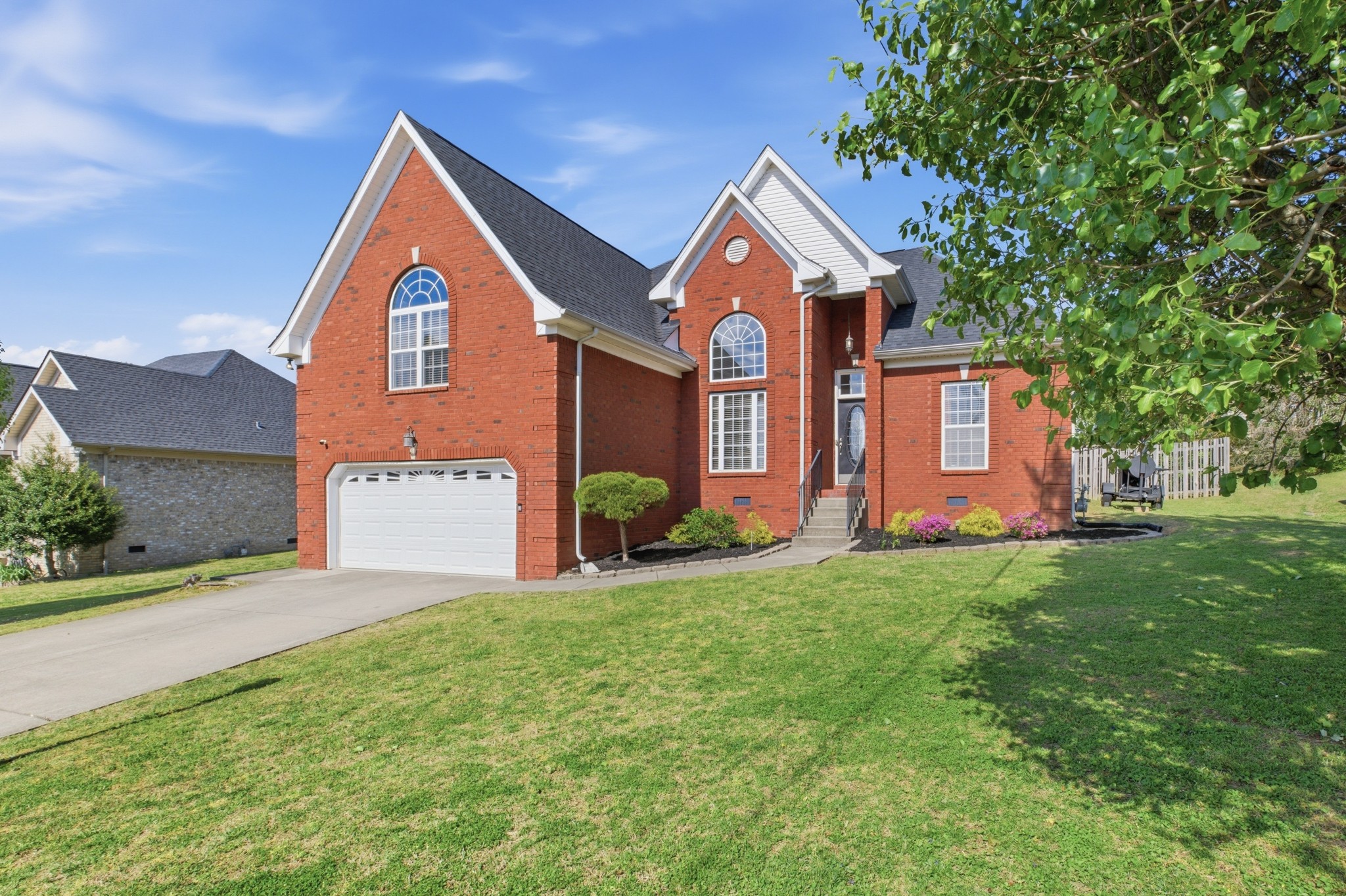 608 Windtree Pass Mount Juliet, TN 37122 - Photo 1 of 35 a front view of a house with yard