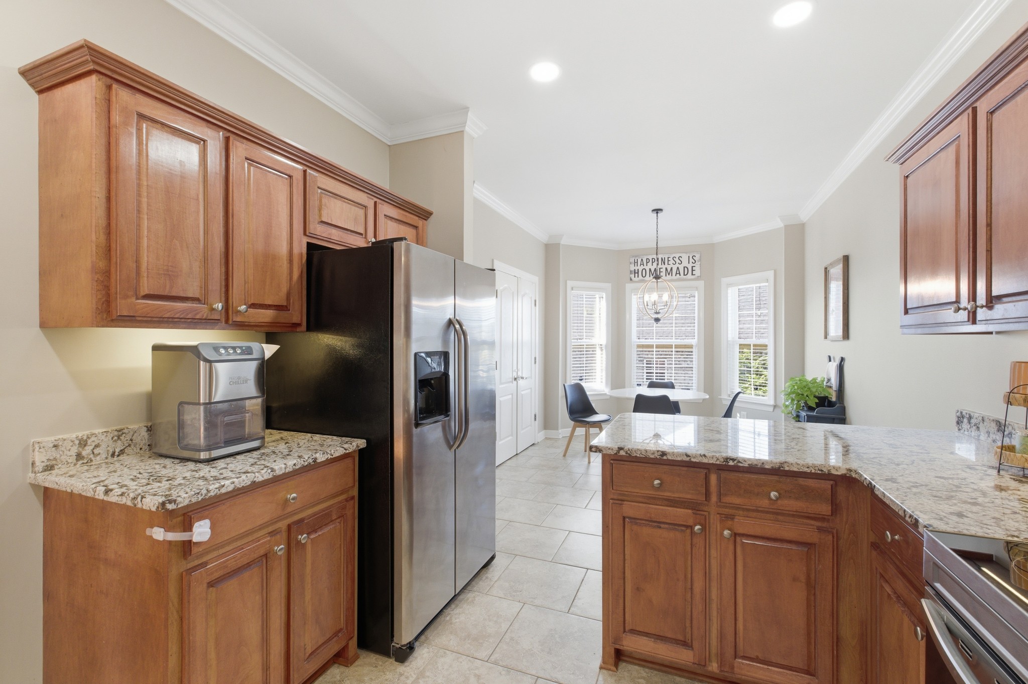 608 Windtree Pass Mount Juliet, TN 37122 - Photo 11 of 35 a kitchen with stainless steel appliances granite countertop a refrigerator and a sink