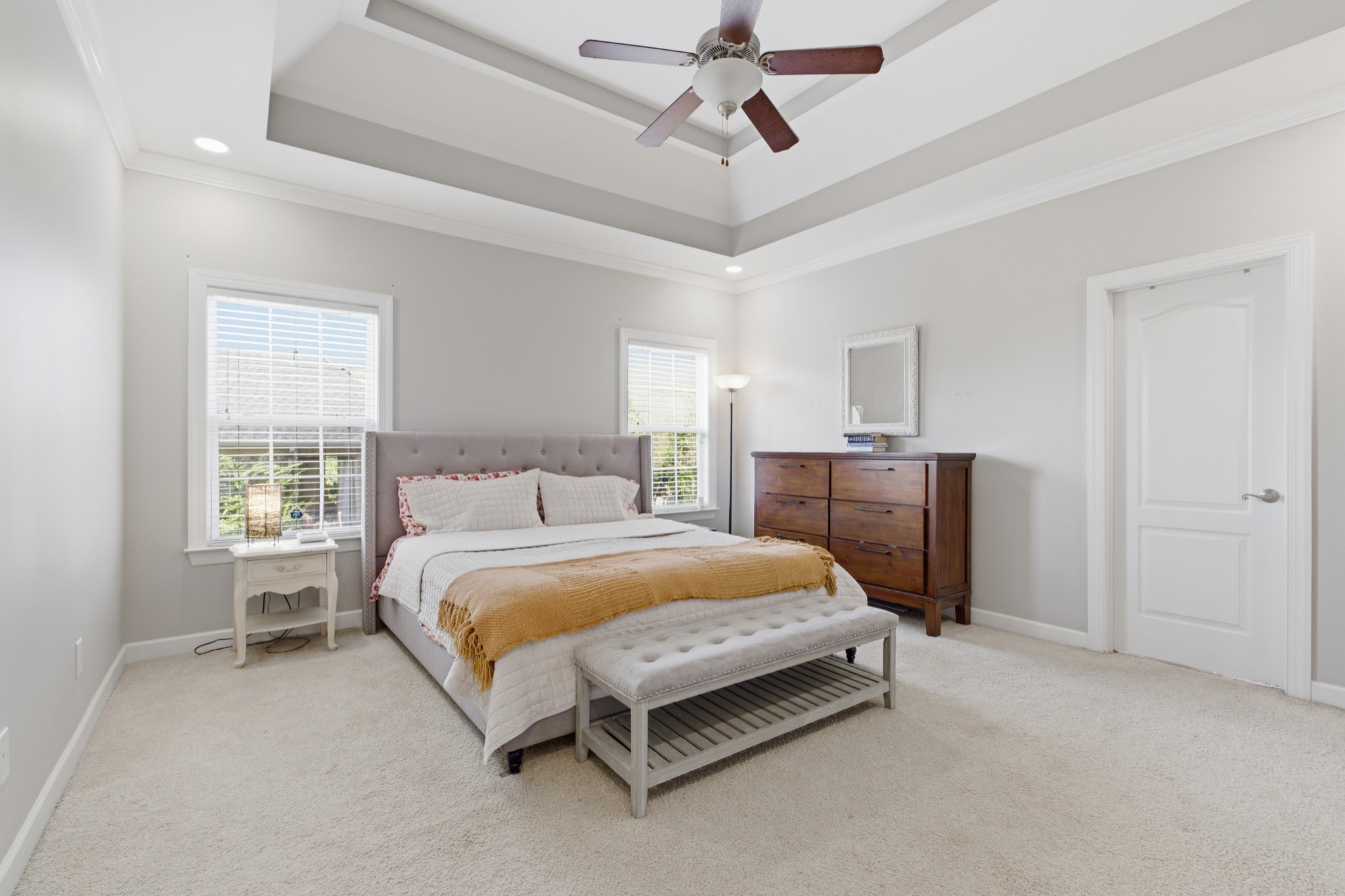 608 Windtree Pass Mount Juliet, TN 37122 - Photo 15 of 35 a spacious bedroom with a bed and a chandelier