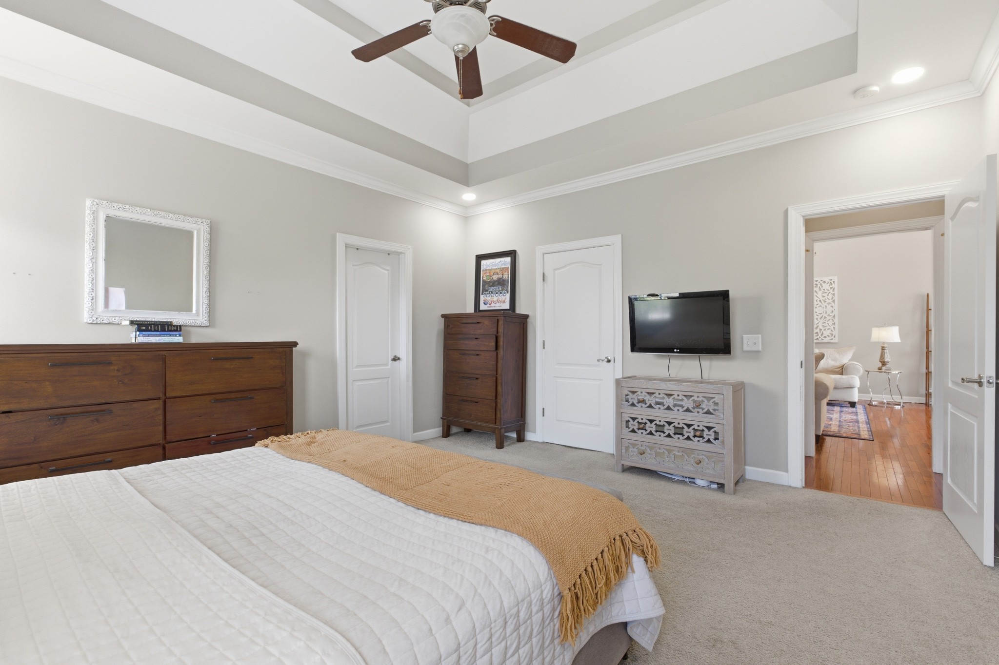 608 Windtree Pass Mount Juliet, TN 37122 - Photo 16 of 35 a bedroom with a bed and a flat tv screen on dresser