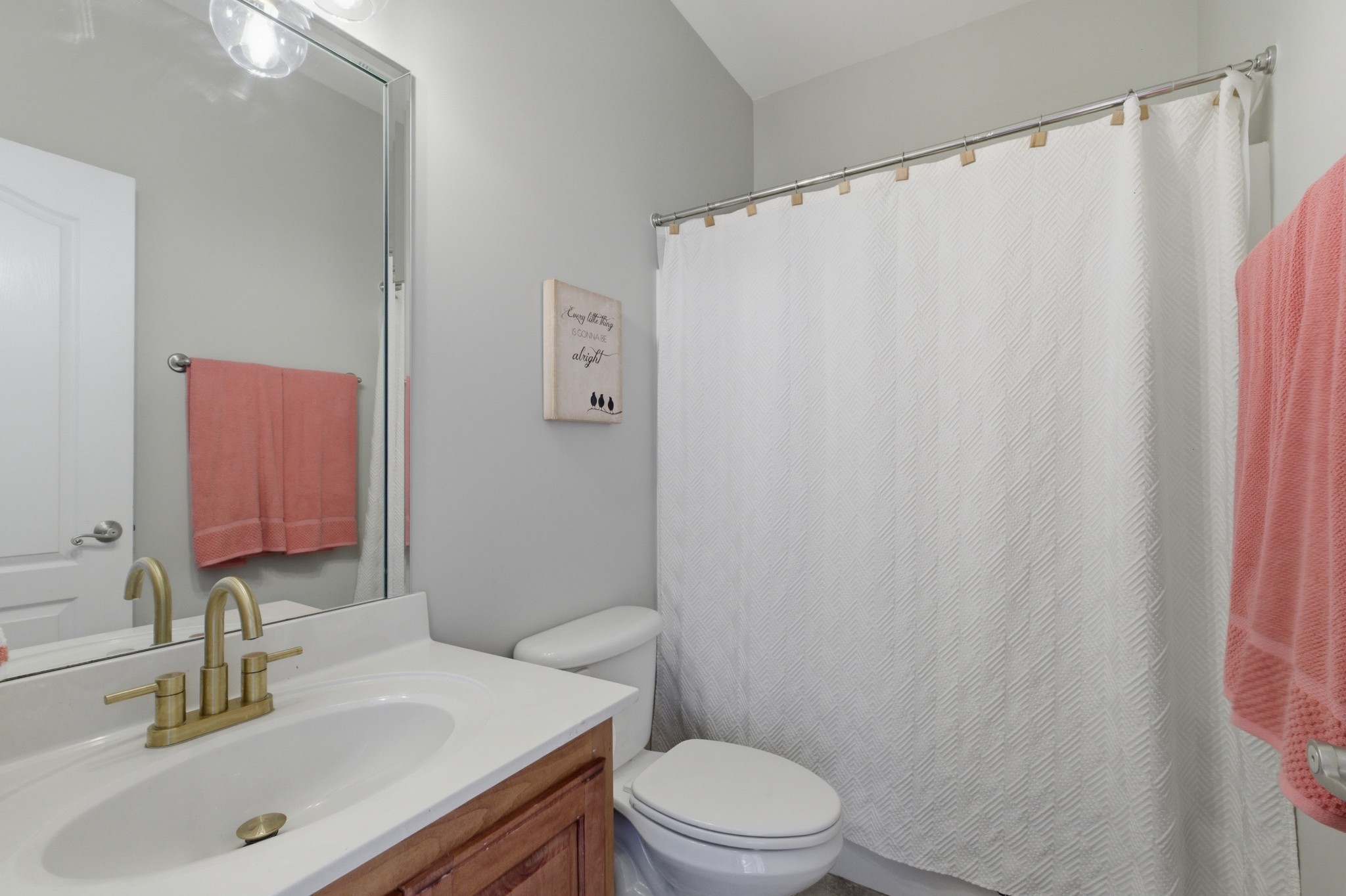 608 Windtree Pass Mount Juliet, TN 37122 - Photo 19 of 35 a bathroom with a sink a toilet and shower curtain