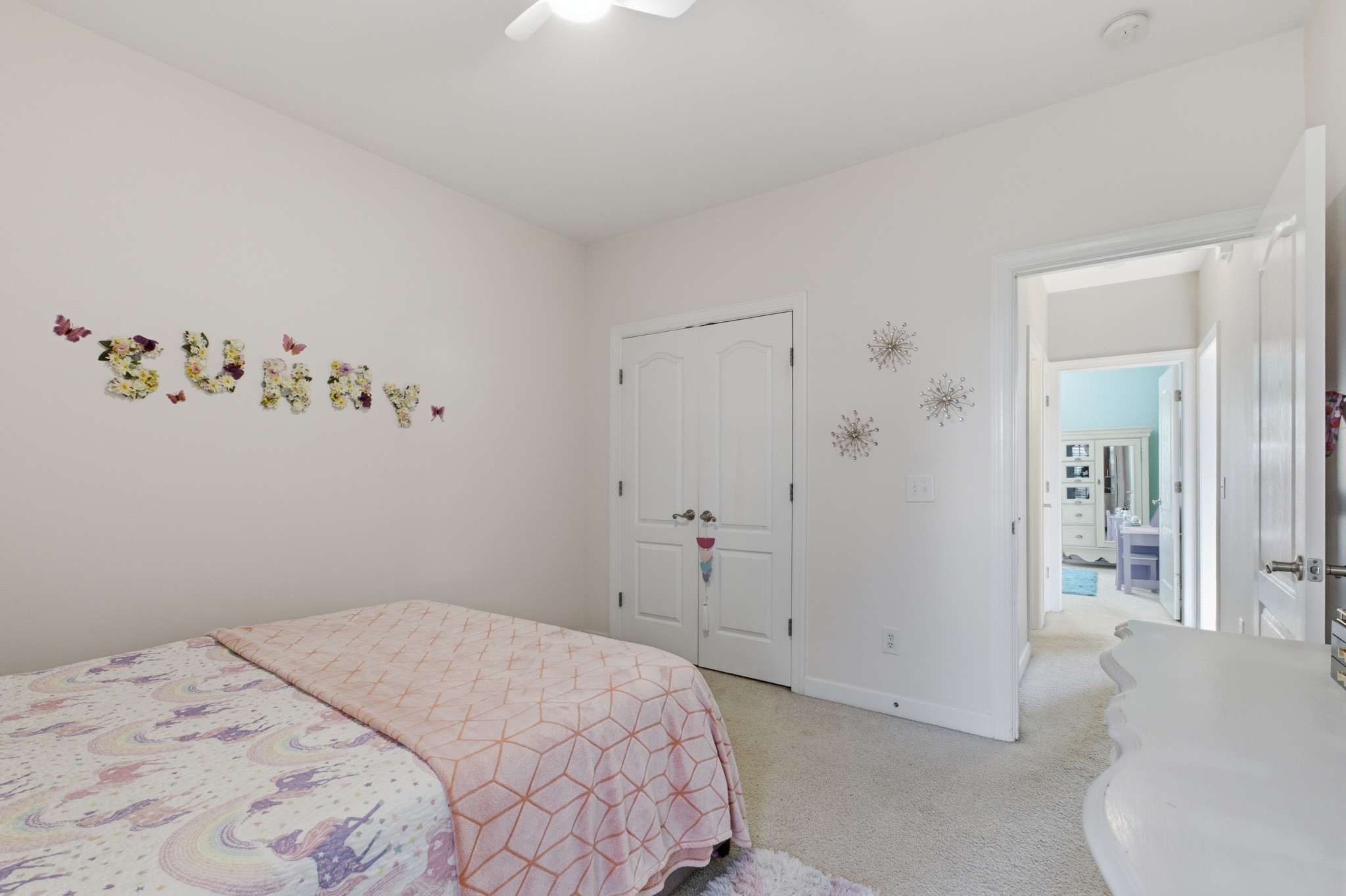 608 Windtree Pass Mount Juliet, TN 37122 - Photo 24 of 35 a bedroom with a bed and a chandelier