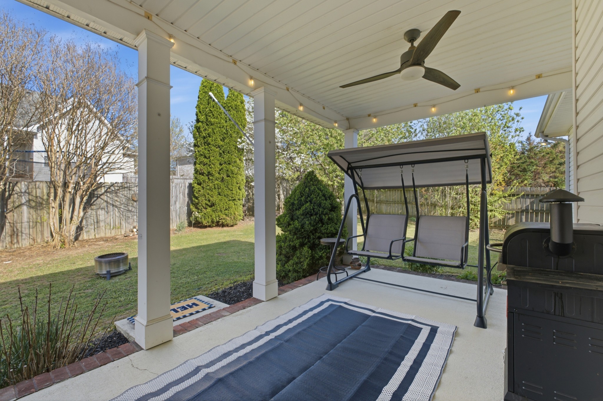 608 Windtree Pass Mount Juliet, TN 37122 - Photo 28 of 35 a living room with hardwood floor and a floor to ceiling window