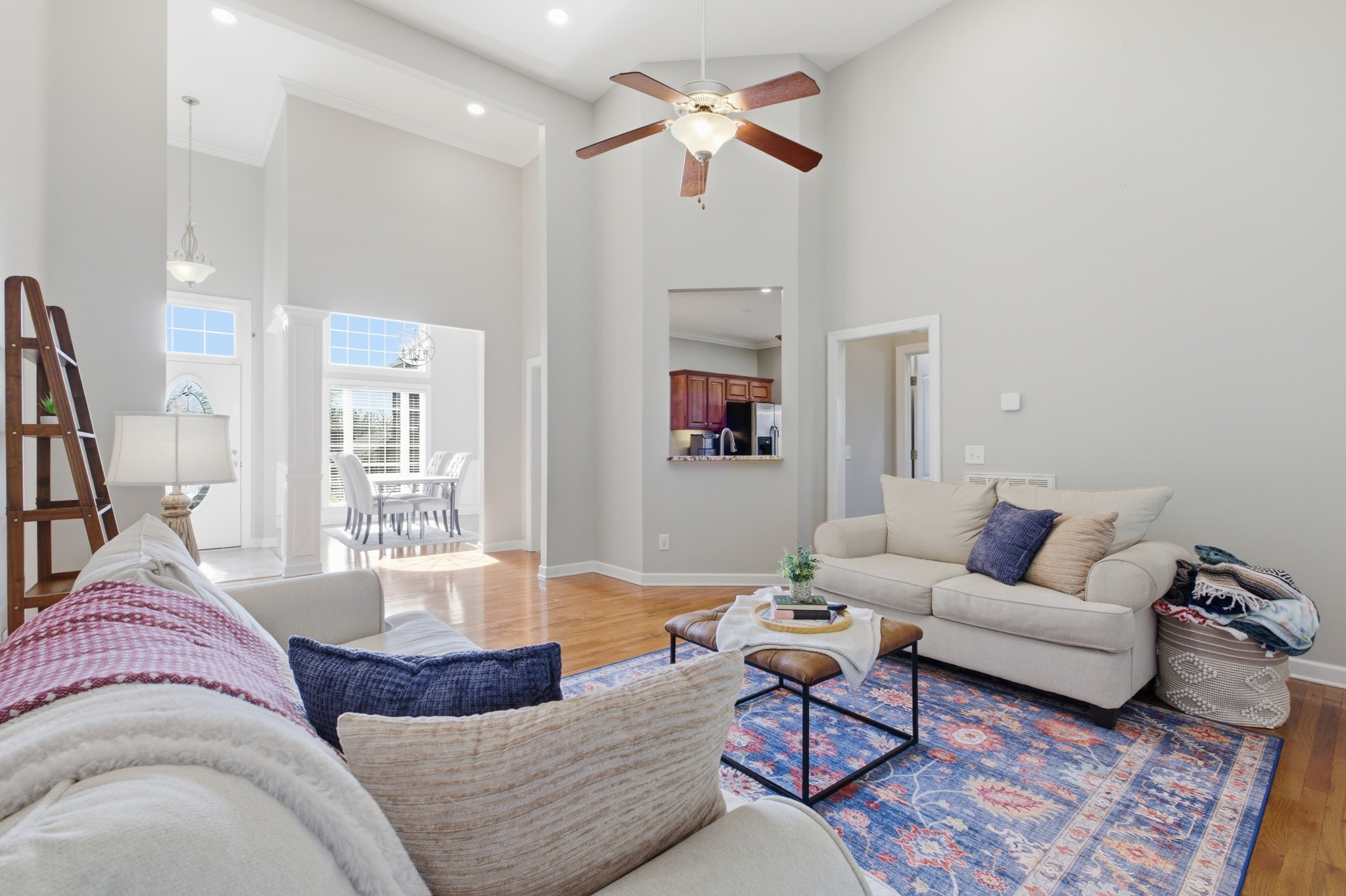 608 Windtree Pass Mount Juliet, TN 37122 - Photo 6 of 35 a living room with furniture and a chandelier