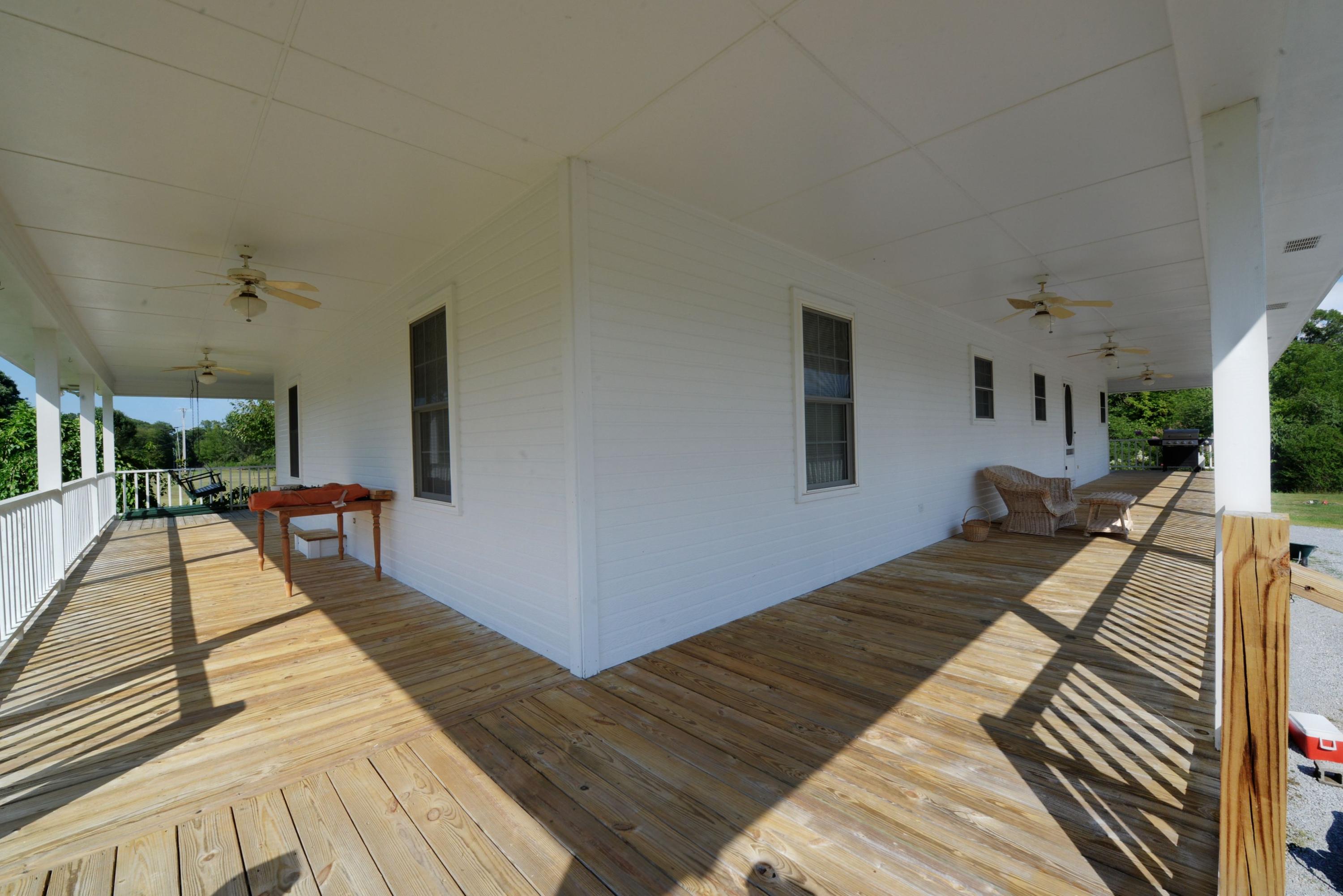 1116 Aslinger Road Sale Creek, TN 37373 - Photo 28 of 30 1116 aslinger porch wrap 2