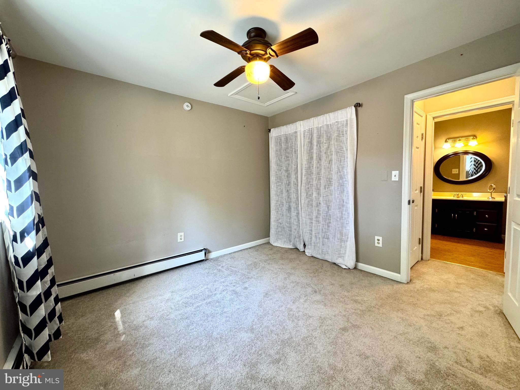 211 Queen Anne Road Stevensville, MD 21666 - Photo 46 of 56 Bedroom 3 across from 2nd full bath