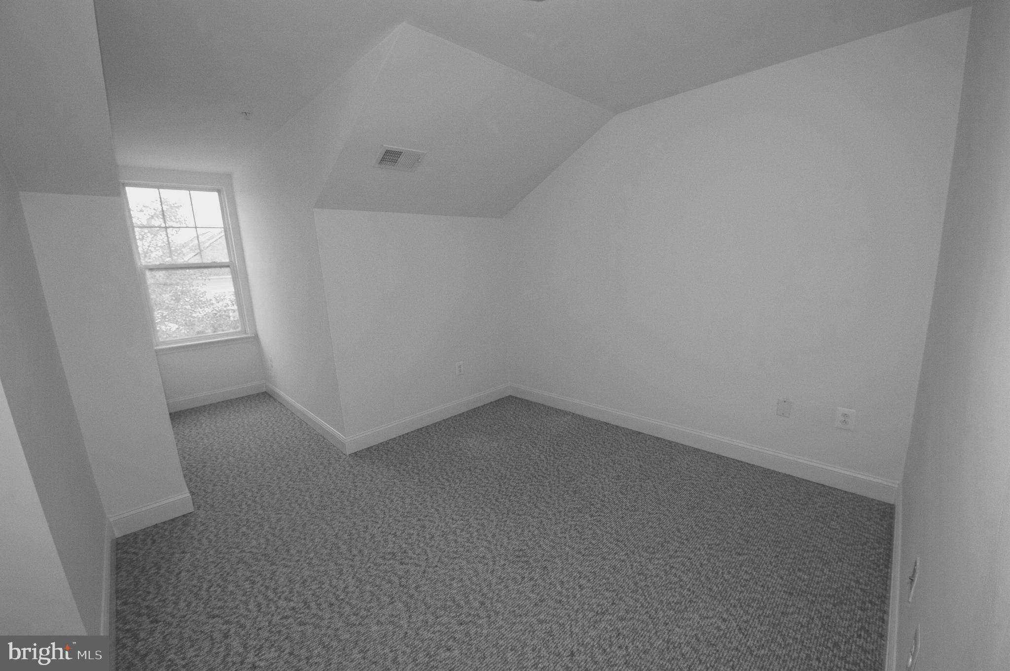 13204 Rabbit Chase Road Laurel, MD 20707 - Photo 18 of 35 an empty room with windows