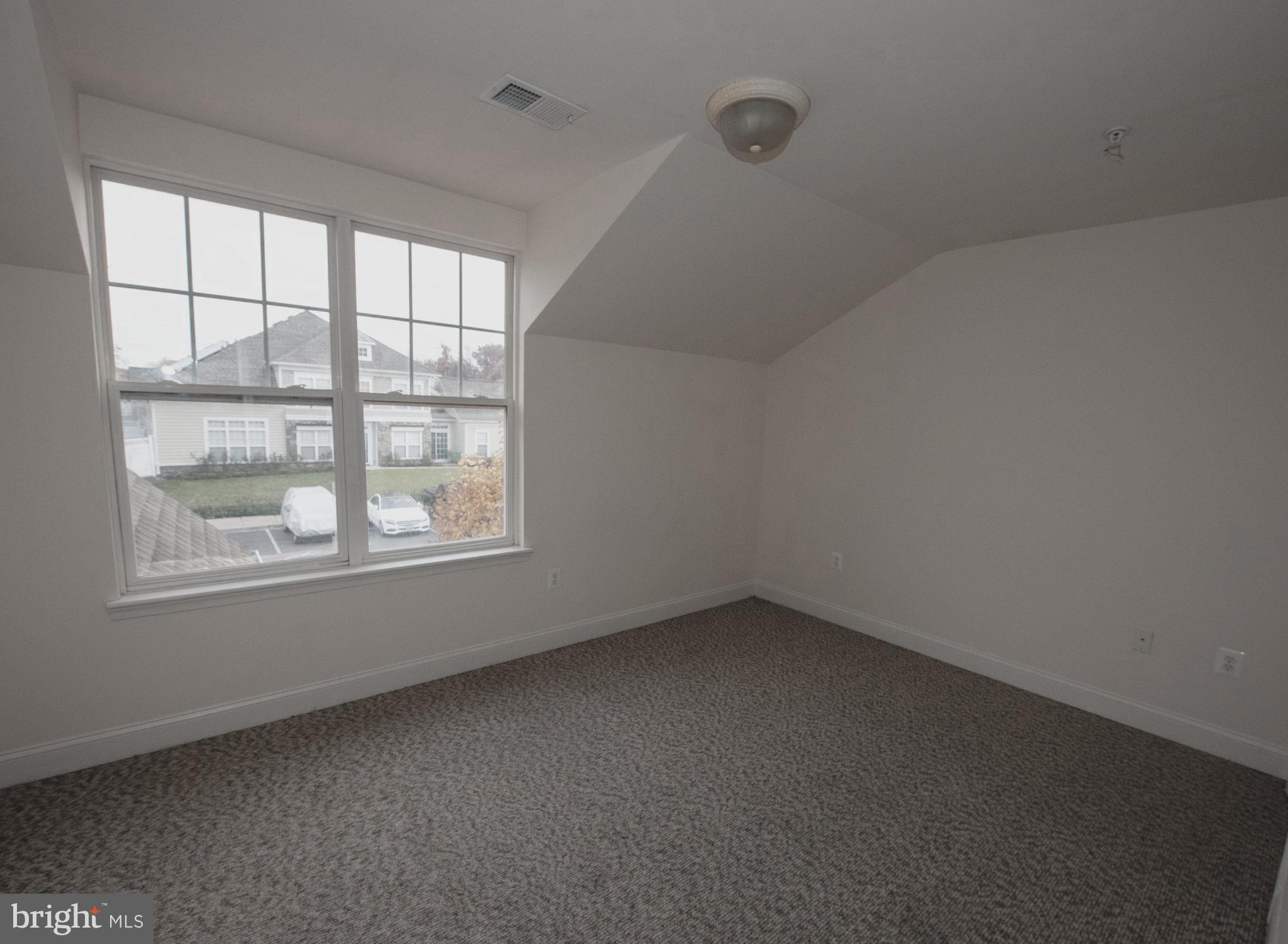 13204 Rabbit Chase Road Laurel, MD 20707 - Photo 23 of 35 an empty room with a window