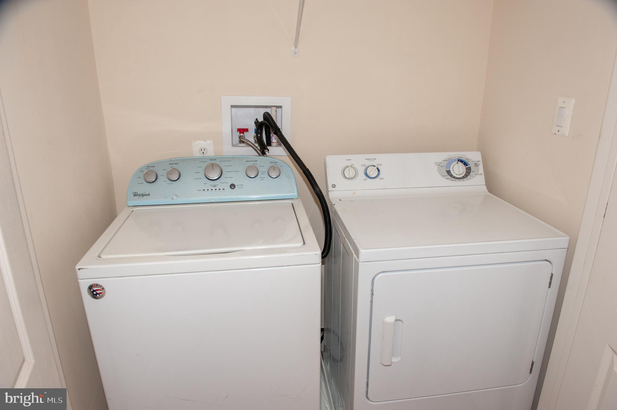 13204 Rabbit Chase Road Laurel, MD 20707 - Photo 28 of 35 a utility room with dryer and washer