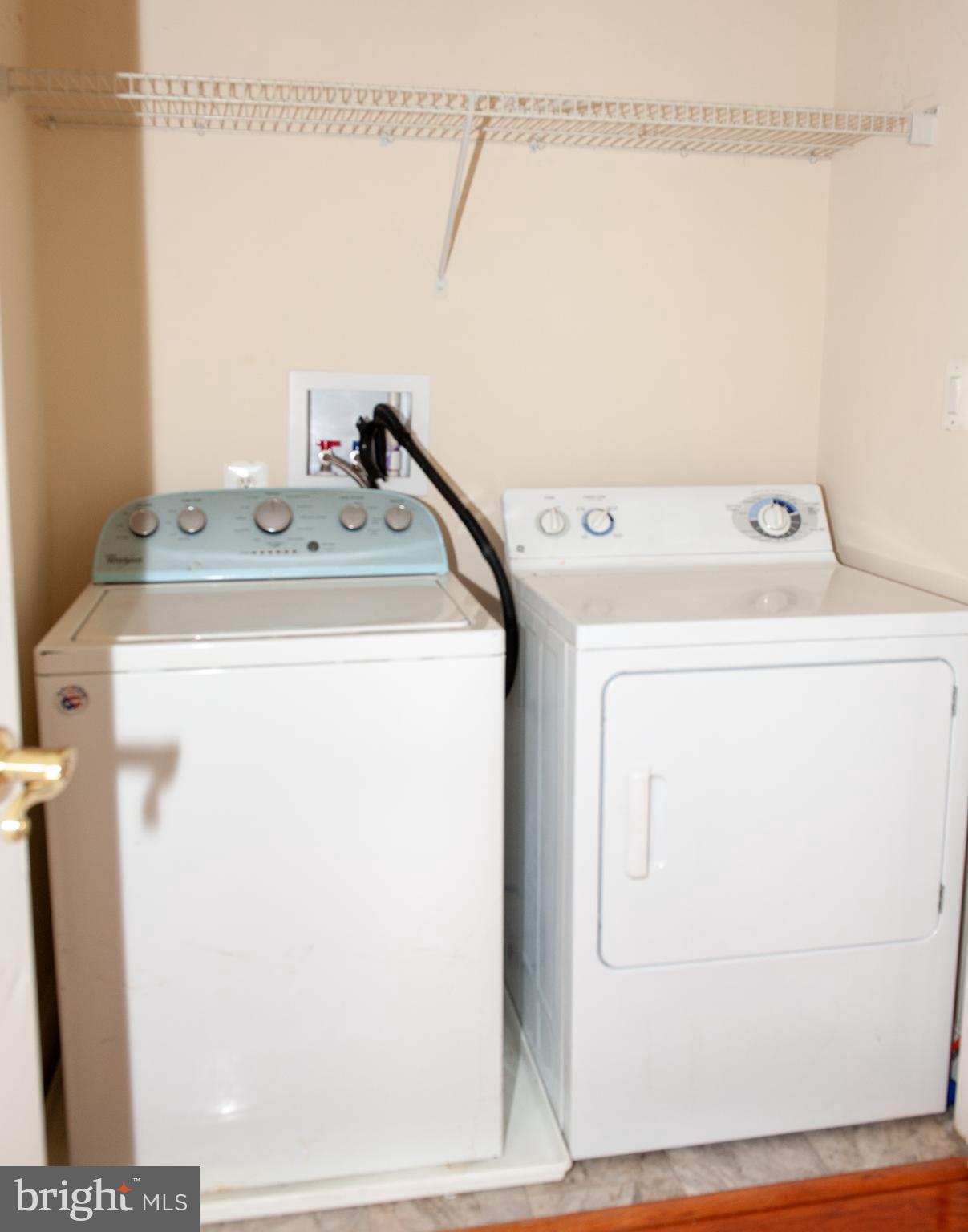 13204 Rabbit Chase Road Laurel, MD 20707 - Photo 29 of 35 a utility room with dryer and washer
