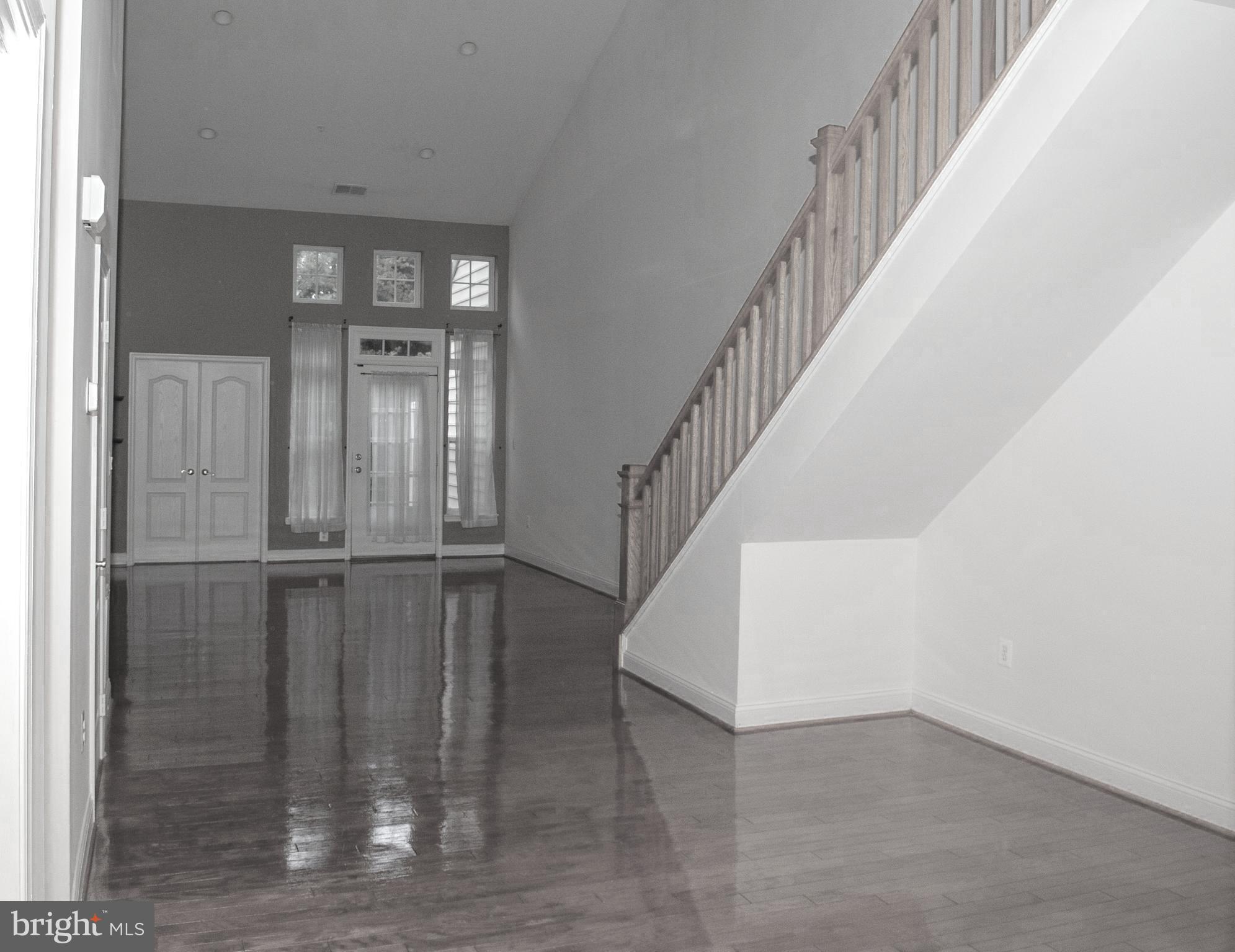 13204 Rabbit Chase Road Laurel, MD 20707 - Photo 5 of 35 a view of an entryway with wooden floor