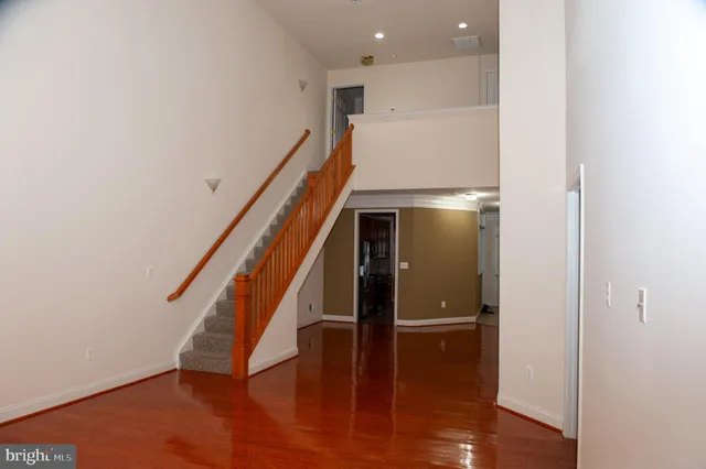 a view of entryway with wooden floor