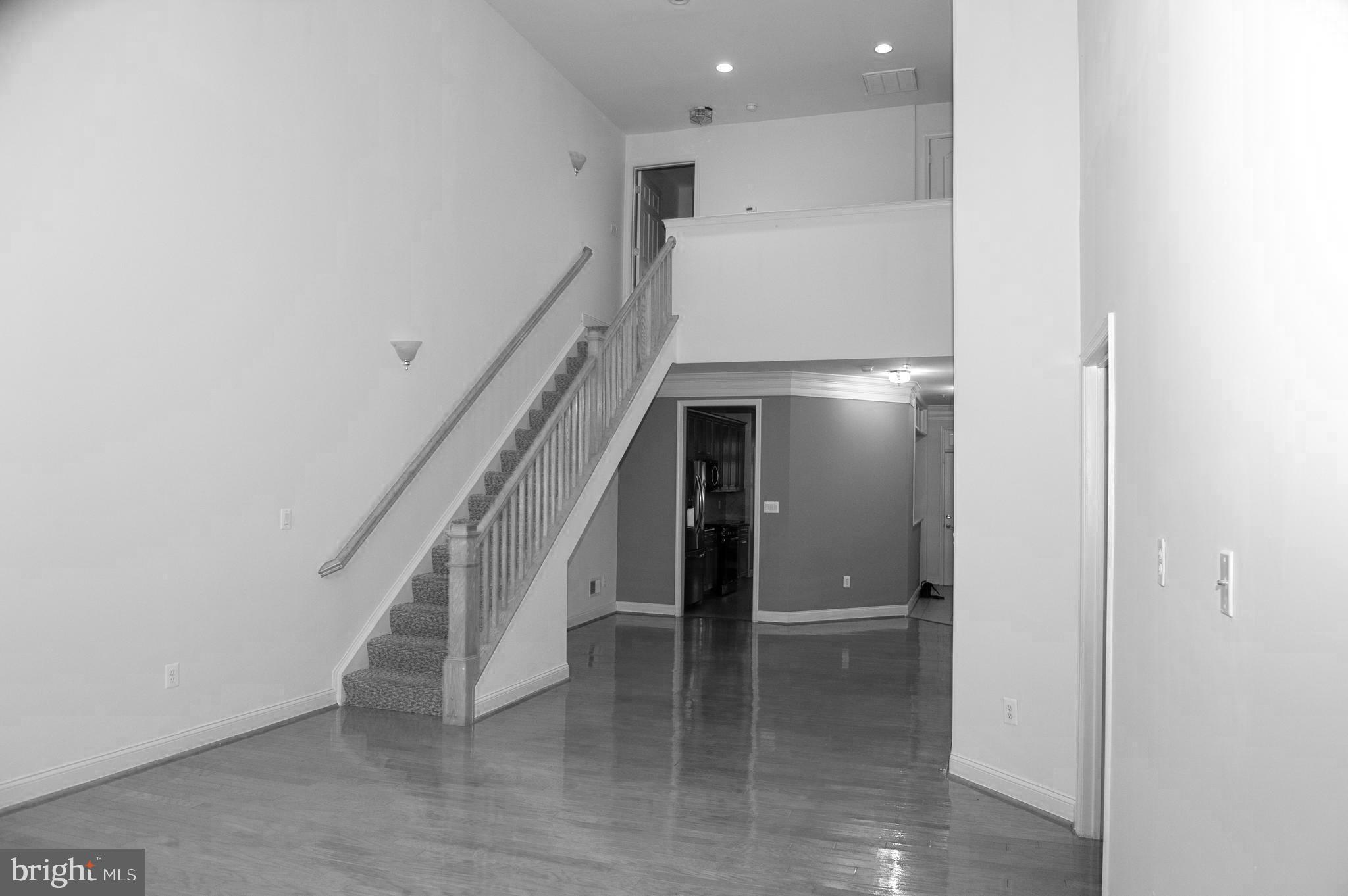 13204 Rabbit Chase Road Laurel, MD 20707 - Photo 6 of 35 a view of entryway and hall with a hallway