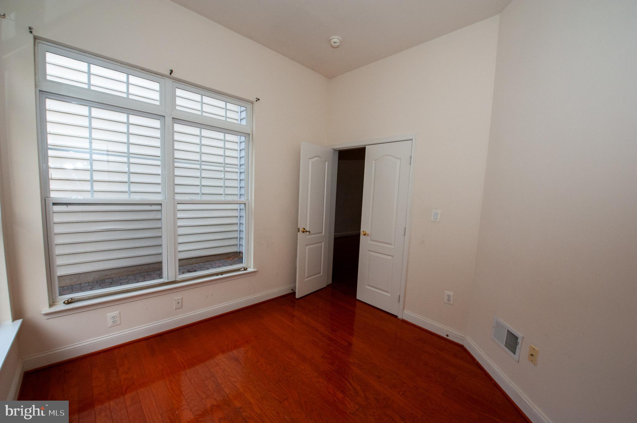 13204 Rabbit Chase Road Laurel, MD 20707 - Photo 8 of 35 an empty room with a window