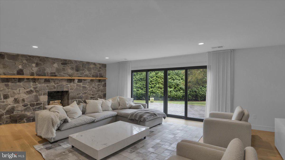 1433 Southwind Way Dresher, PA 19025 - Photo 12 of 37 a living room with furniture and a fireplace