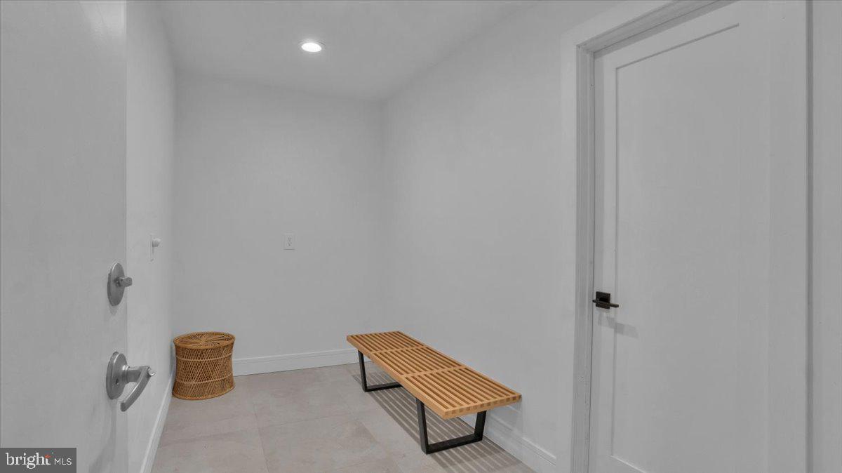 1433 Southwind Way Dresher, PA 19025 - Photo 16 of 37 a bench sitting in middle of a room