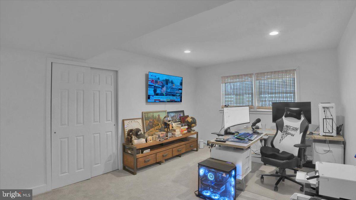 1433 Southwind Way Dresher, PA 19025 - Photo 17 of 37 a living room with furniture and a window