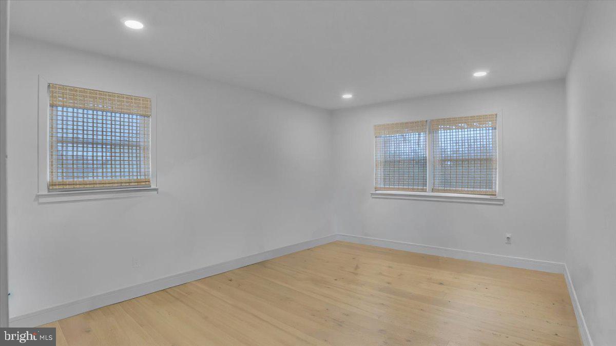 1433 Southwind Way Dresher, PA 19025 - Photo 25 of 37 a view of empty room with windows