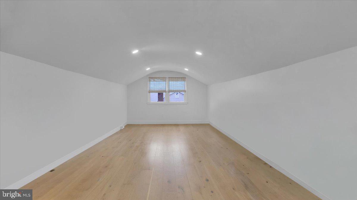 1433 Southwind Way Dresher, PA 19025 - Photo 26 of 37 an empty room with wooden floor and windows