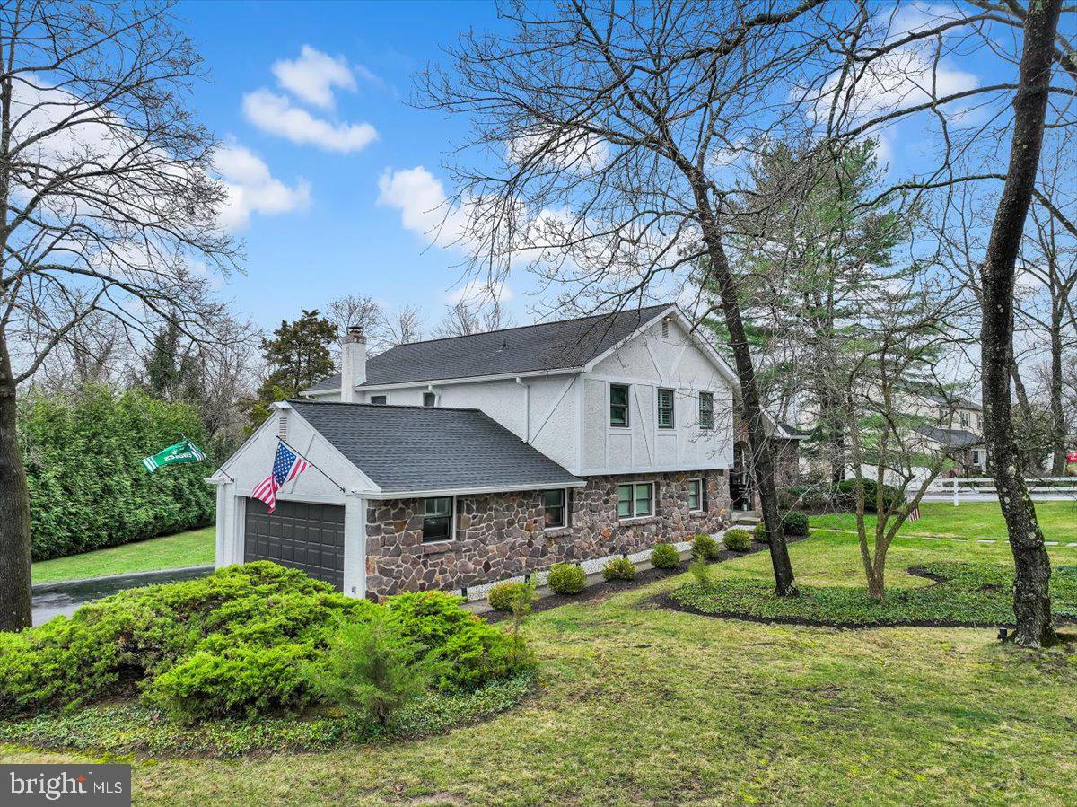 1433 Southwind Way Dresher, PA 19025 - Photo 31 of 37 a house view with a garden and trees