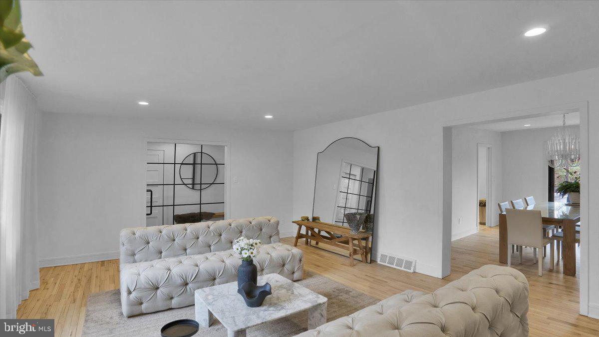 1433 Southwind Way Dresher, PA 19025 - Photo 5 of 37 a living room with furniture and a couch