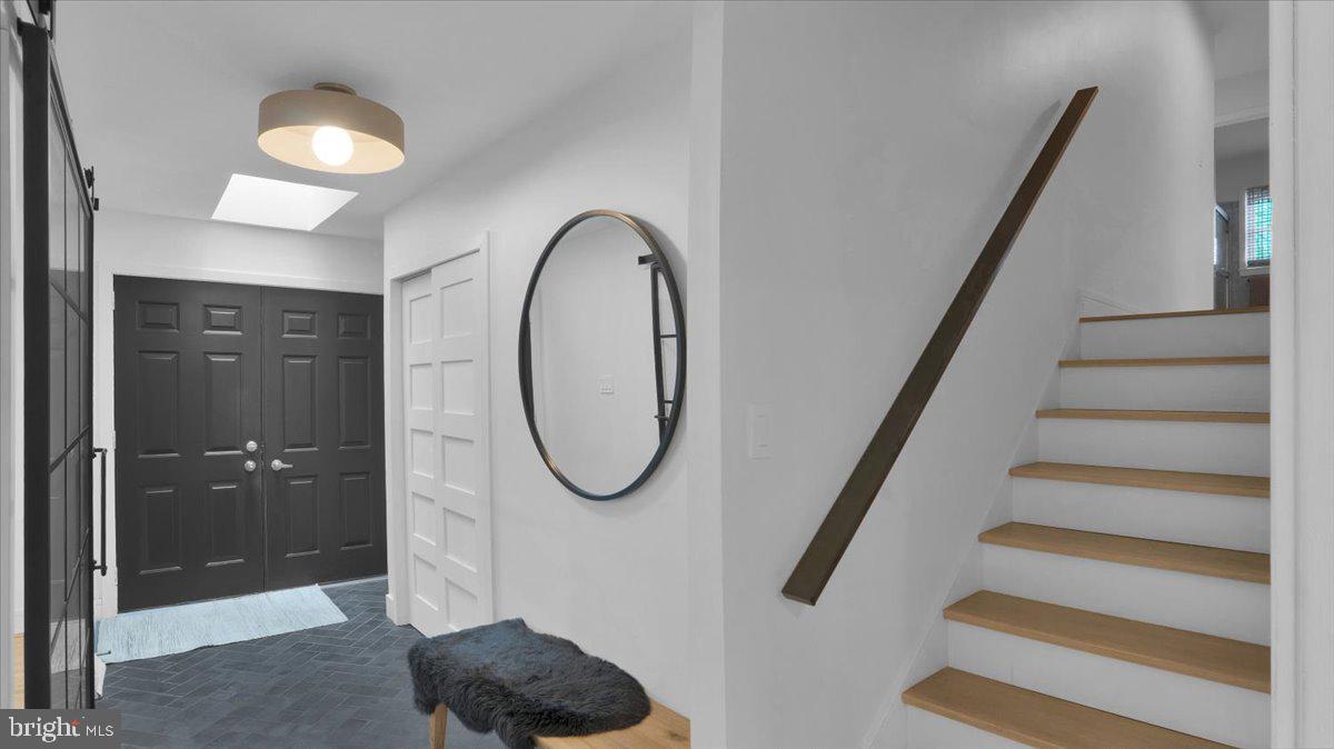 1433 Southwind Way Dresher, PA 19025 - Photo 10 of 37 a view of entryway and hall with wooden floor