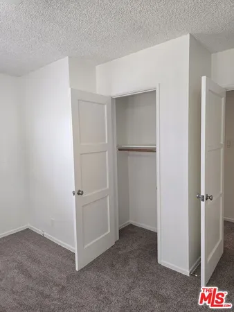 an empty room with closet
