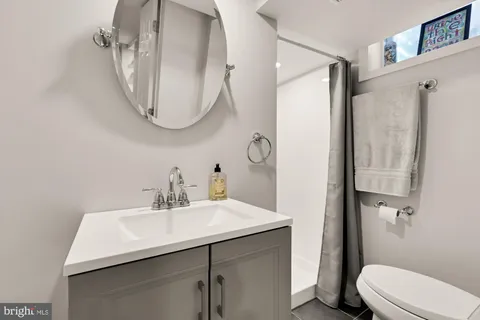 a view of a backyard with sitting area