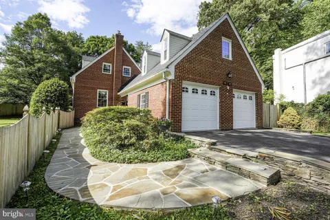a swimming pool with wooden fence
